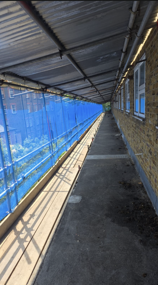 Commercial block refurbishment protected walkway scaffold London
